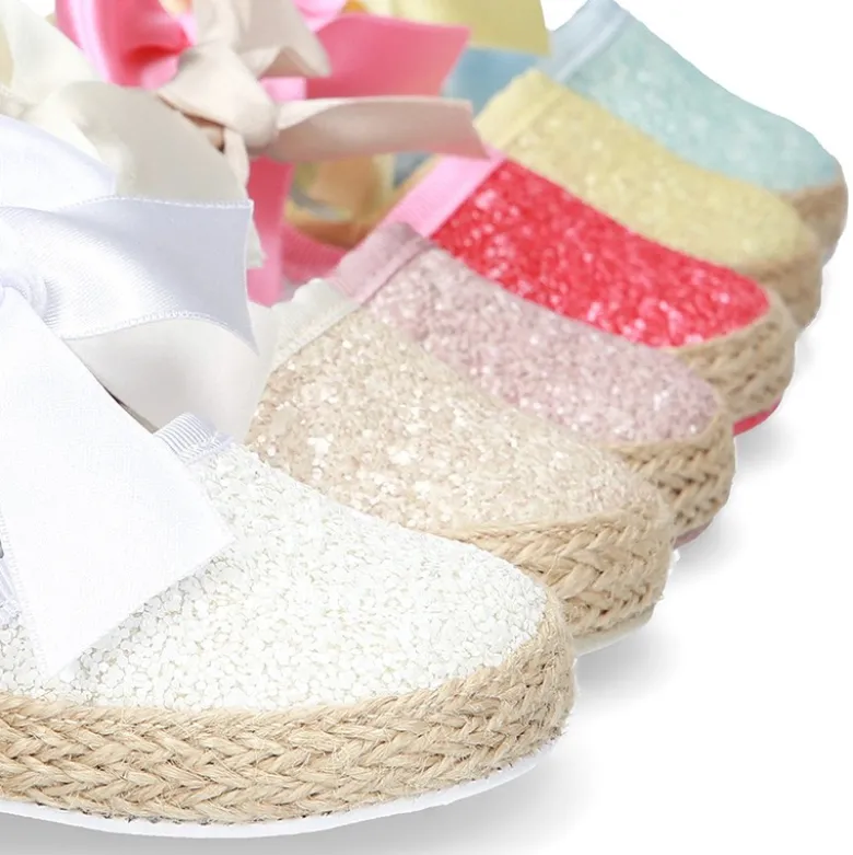 Alpargata BABY con cierre adherente y lazo en piel con GLITTER.