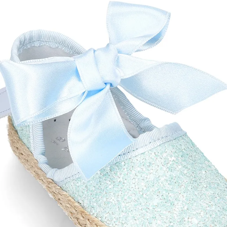 Alpargata BABY con cierre adherente y lazo en piel con GLITTER.