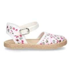 Alpargata niña con hebilla en lona con estampado de FLORES.