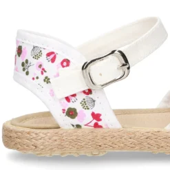 Alpargata niña con hebilla en lona con estampado de FLORES.