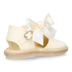 Alpargata niña con LAZO SEDA en lona piqué algodón beige.