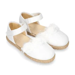 Alpargata niña lona metalizada en color BLANCO con cierre adherente.