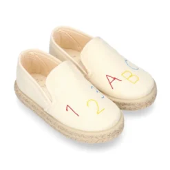 Alpargata niño números y letras con elásticos tipo SLIP ON en lona piqué.