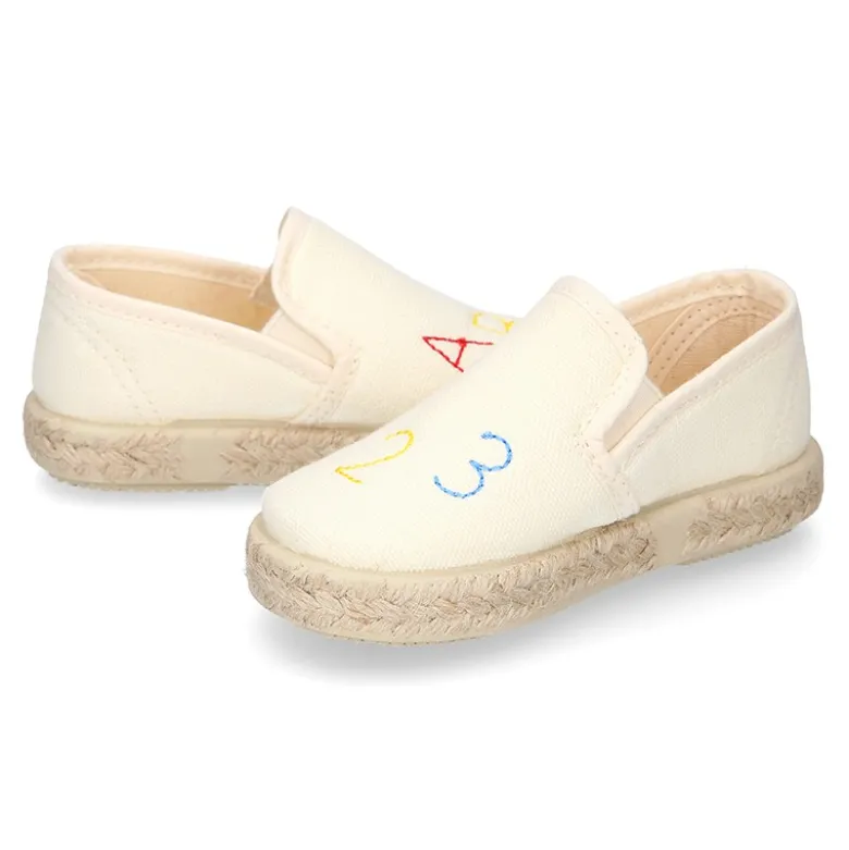 Alpargata niño números y letras con elásticos tipo SLIP ON en lona piqué.