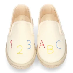 Alpargata niño números y letras con elásticos tipo SLIP ON en lona piqué.