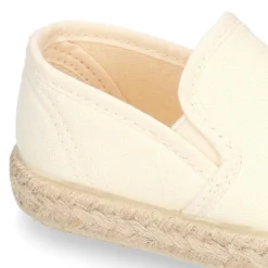 Alpargata niño números y letras con elásticos tipo SLIP ON en lona piqué.