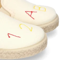 Alpargata niño números y letras con elásticos tipo SLIP ON en lona piqué.