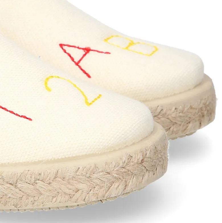 Alpargata niño números y letras con elásticos tipo SLIP ON en lona piqué.