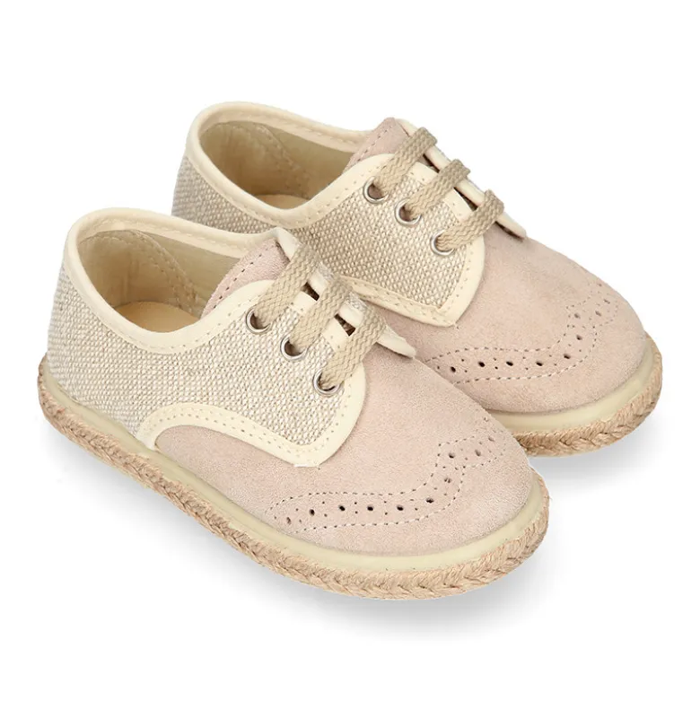 Alpargata niño tipo Blucher con cordones en piel serraje con lino natural.