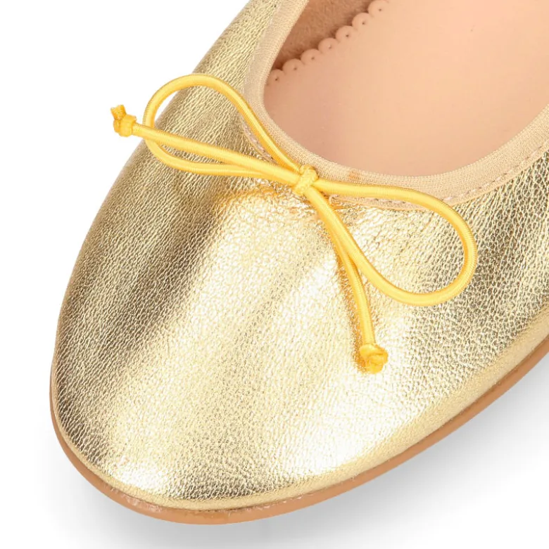 Bailarina clásica niña con lazo ajustable y elástico en piel Oro.