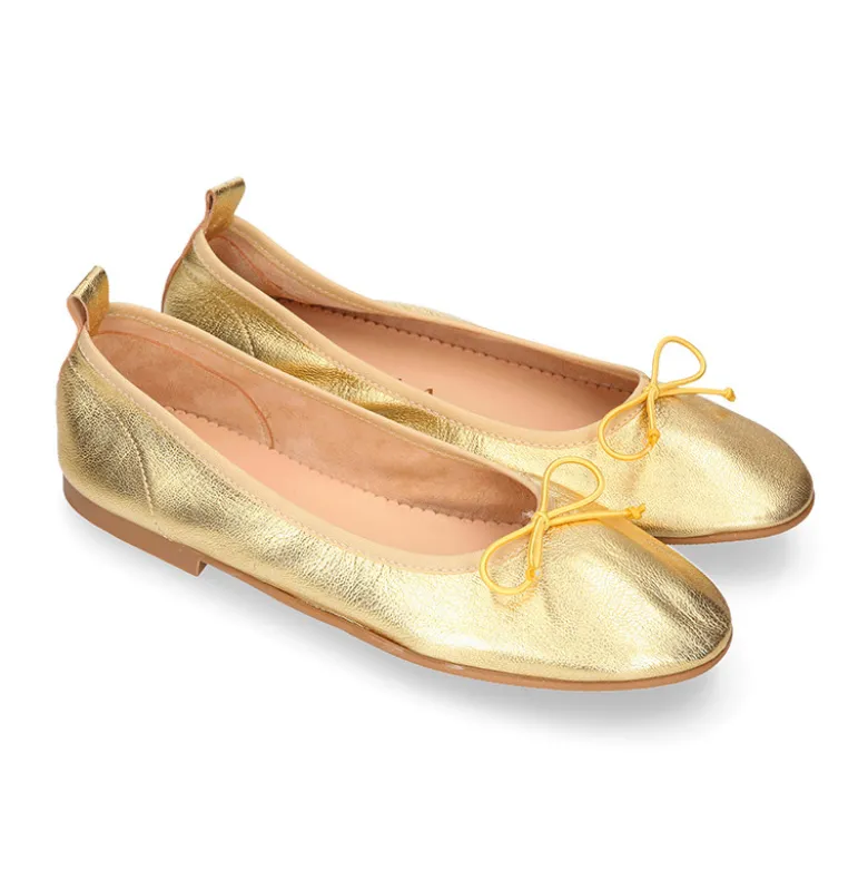 Bailarina clásica niña con lazo ajustable y elástico en piel Oro.