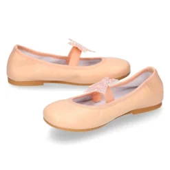 Bailarina niña con elástico y estrella en piel napa melocotón.