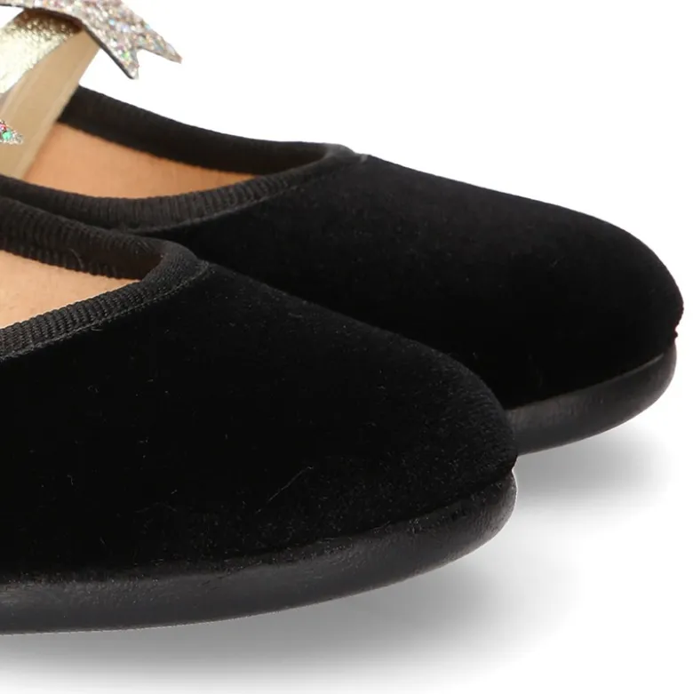 Bailarina niña en terciopelo negro de vestir con ESTRELLA.