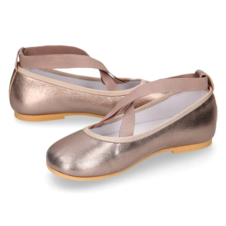 Bailarina niña tipo Ballet con cintas cruzadas elásticas en piel bronce.