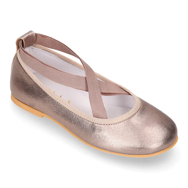 Bailarina niña tipo Ballet con cintas cruzadas elásticas en piel bronce.