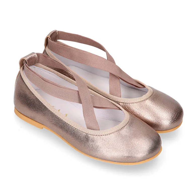 Bailarina niña tipo Ballet con cintas cruzadas elásticas en piel bronce.