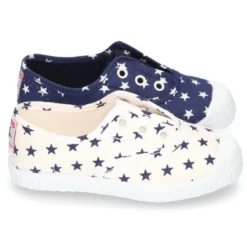 Bamba de lona con ESTRELLAS, elástico y puntera de goma.