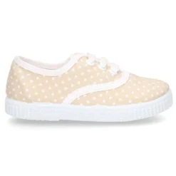Bamba en lona con cordones y estampado lunares en pasteles.