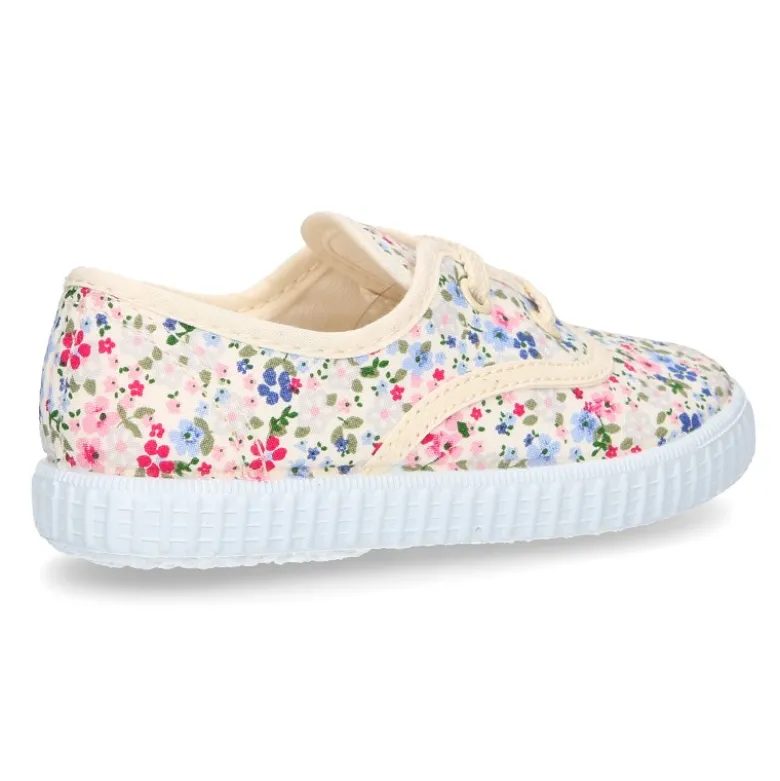 Bamba en lona con cordones y FLORES.