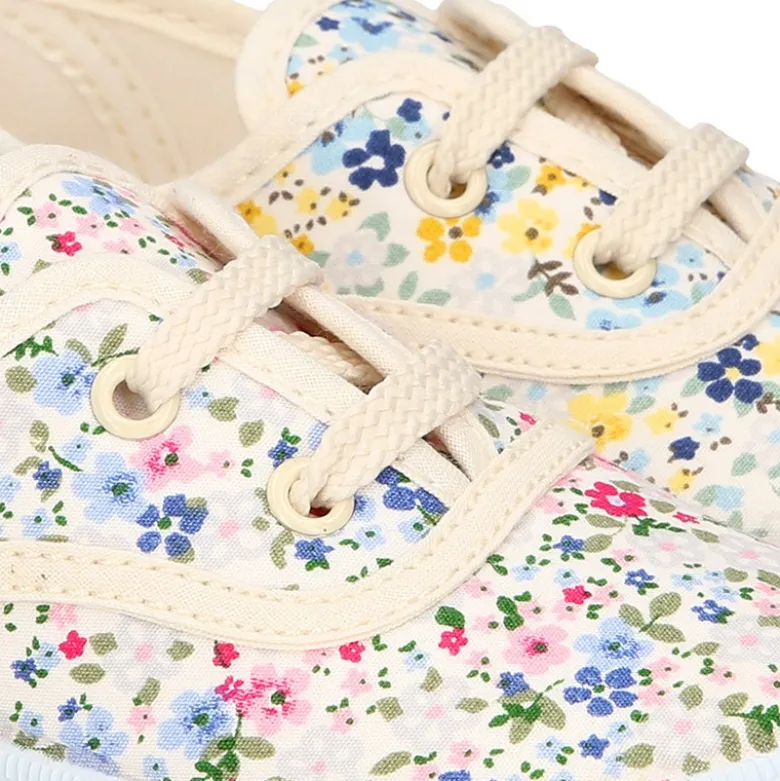 Bamba en lona con cordones y FLORES.