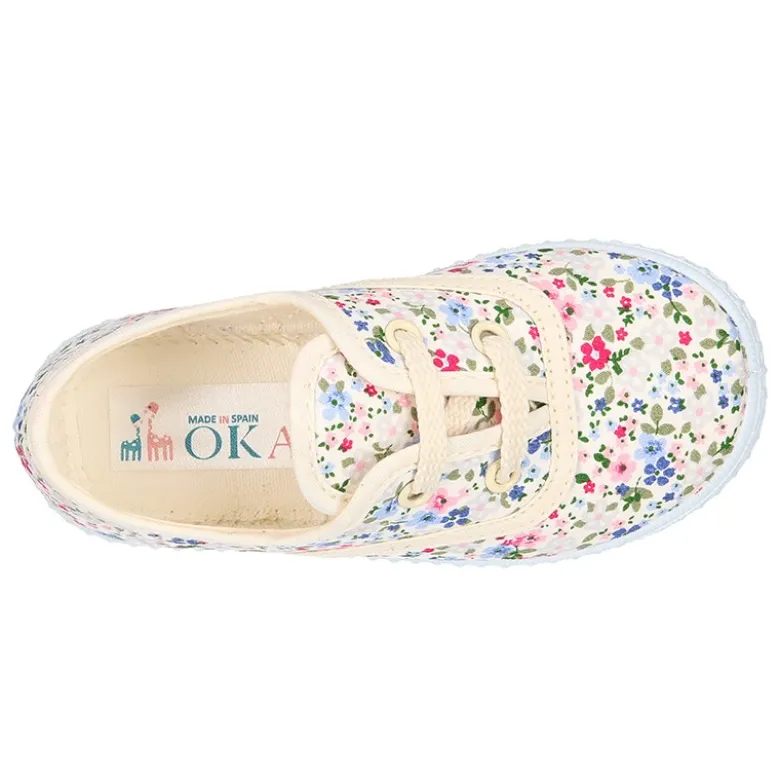 Bamba en lona con cordones y FLORES.