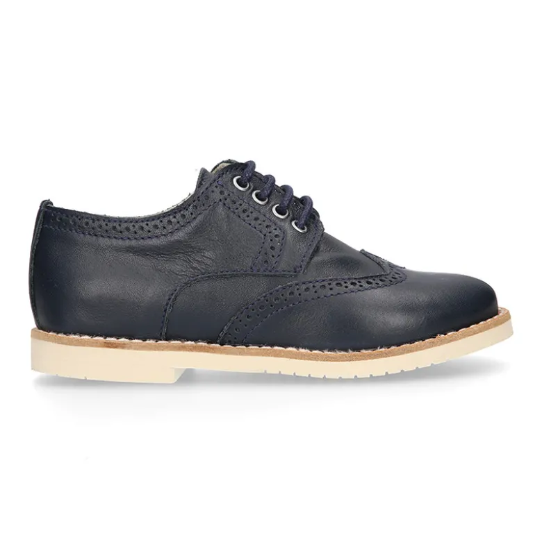Blucher niño ceremonia con cordones en piel napa marino.