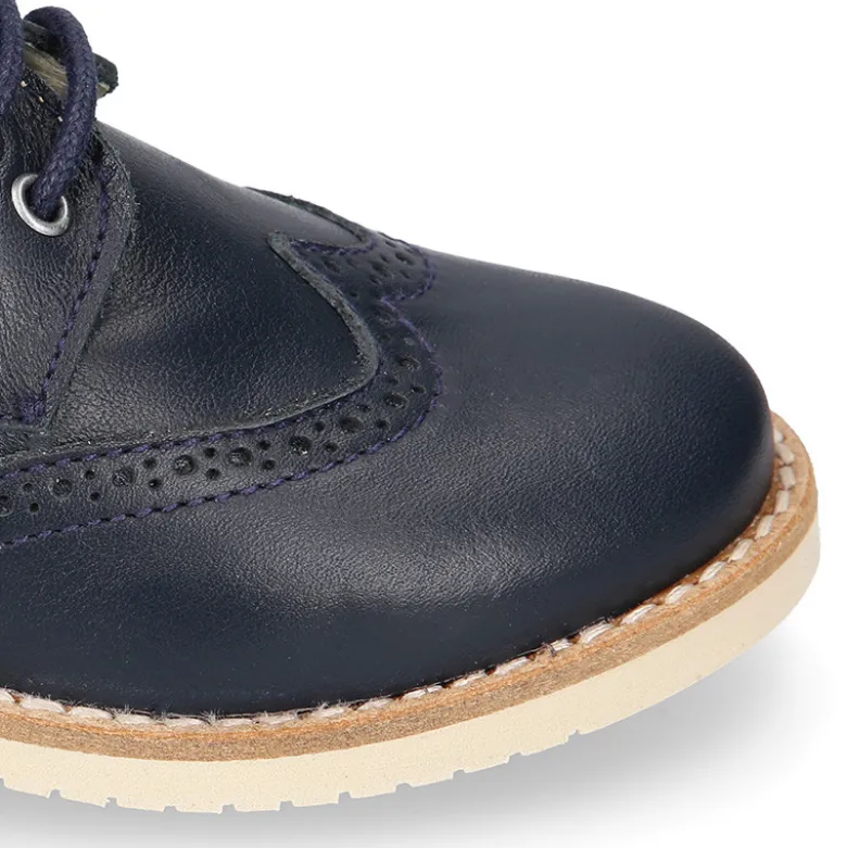 Blucher niño ceremonia con cordones en piel napa marino.