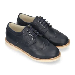 Blucher niño ceremonia con cordones en piel napa marino.