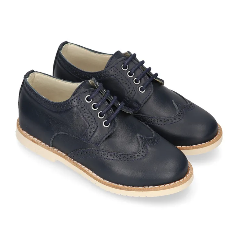 Blucher niño ceremonia con cordones en piel napa marino.