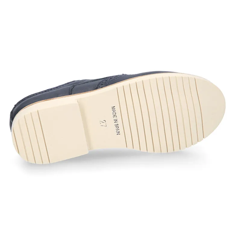 Blucher niño ceremonia con cordones en piel napa marino.