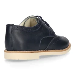 Blucher niño ceremonia con cordones en piel napa marino.