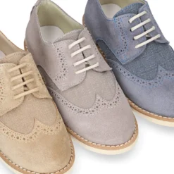 Blucher niño ceremonia con cordones en piel serraje con lino.