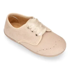 Blucher niños con cordones con lazos y picados en Serratex.