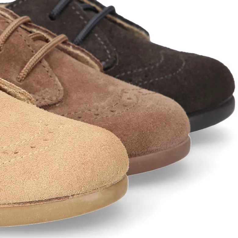 Blucher niños con cordones y picados en piel Serraje.