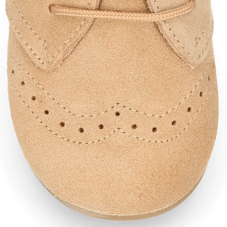 Blucher niños con cordones y picados en piel Serraje.