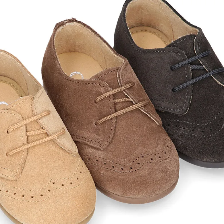 Blucher niños con cordones y picados en piel Serraje.