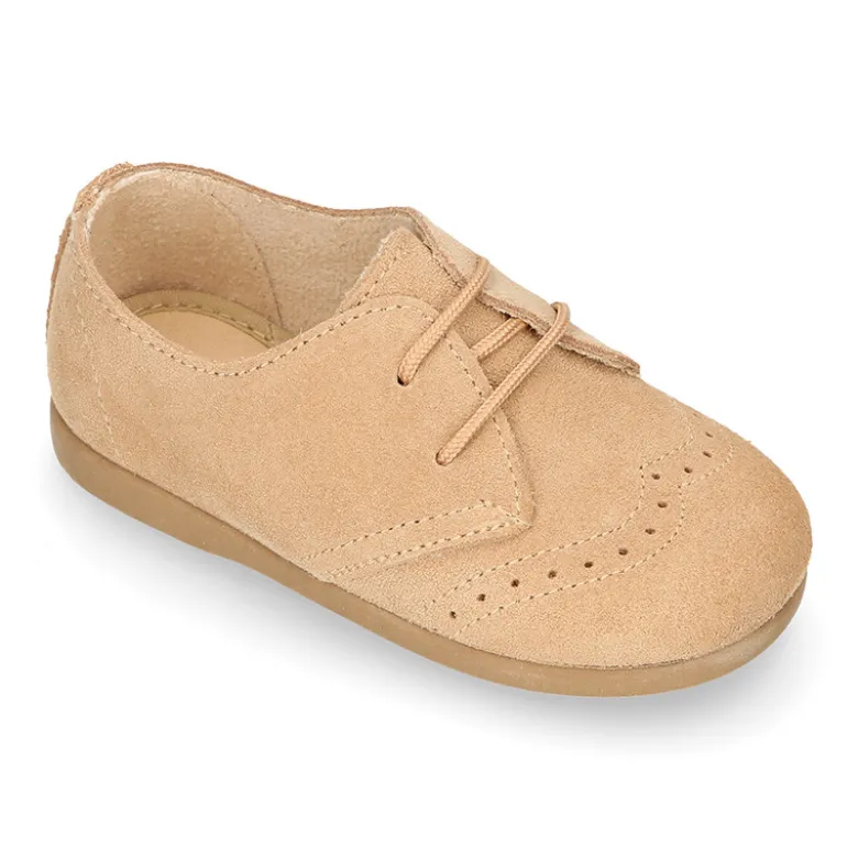 Blucher niños con cordones y picados en piel Serraje.
