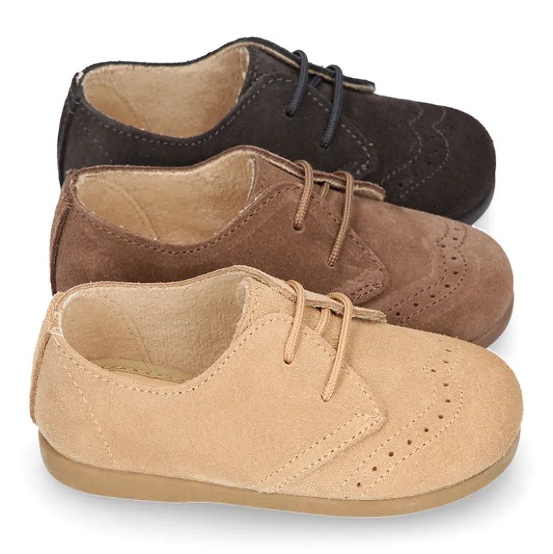 Blucher niños con cordones y picados en piel Serraje.
