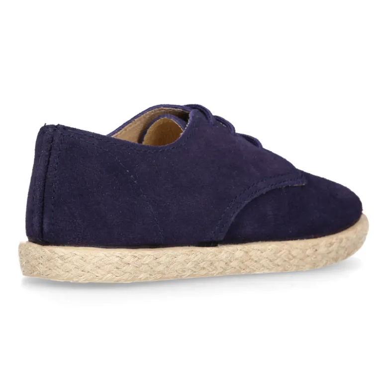 Blucher niños tipo alpargata con cordones en piel serraje.