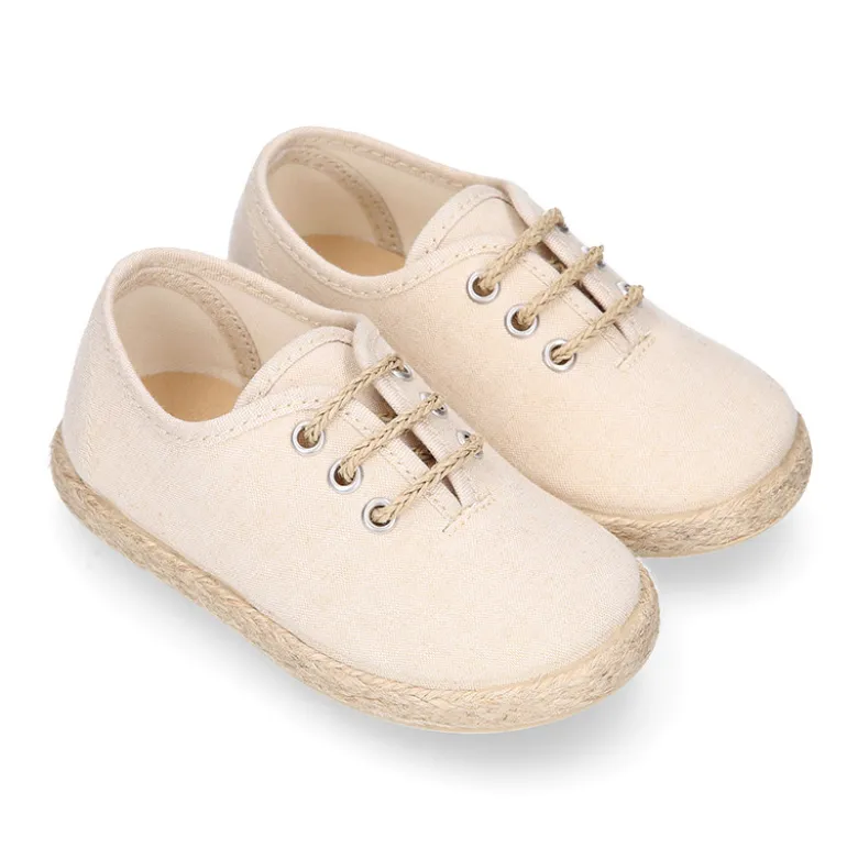 Blucher niño tipo alpargata con cordones en lona vestir.