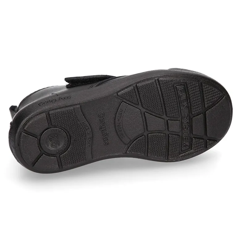 Bota colegial niño OKAA sin cordones y puntera reforzada en piel lavable.