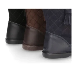 Bota piel lavable combinada con piel serraje acolchado y borlas.