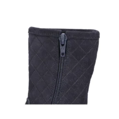 Bota piel lavable combinada con piel serraje acolchado y borlas.