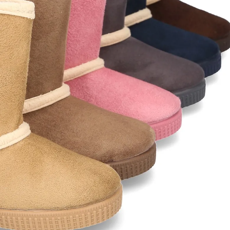 Botas forradas con cierre adherente y suela tipo bamba en Serratex.