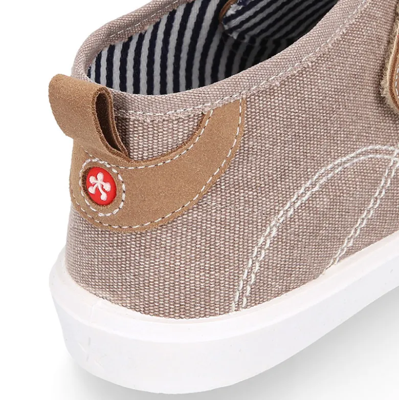 Bota tipo zapatilla sin cordones en lona y serraje.