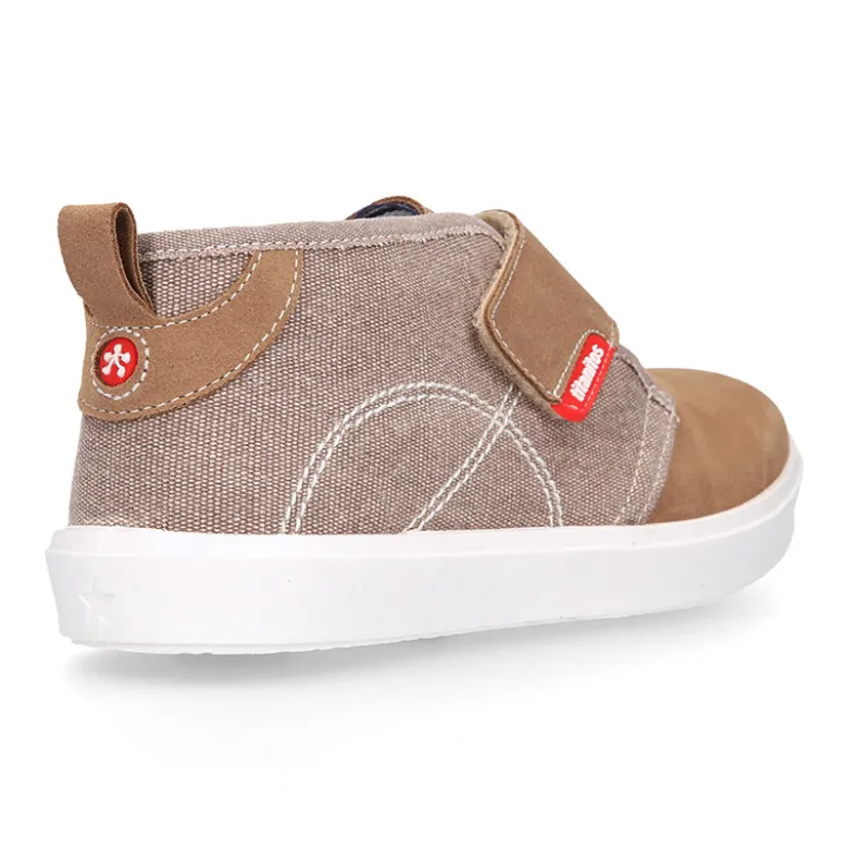Bota tipo zapatilla sin cordones en lona y serraje.