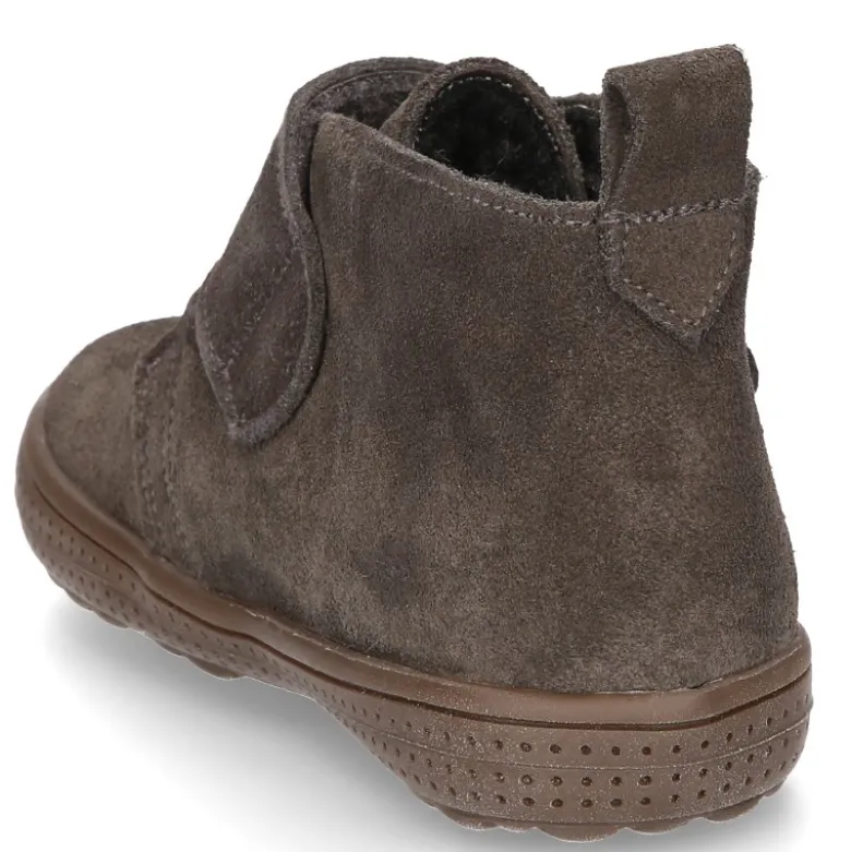 Botita casual sin cordones con borrego interior en piel serraje.