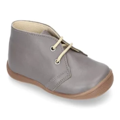 Botita niños cordones con puntera y talonera en piel EXTRA SUAVE.