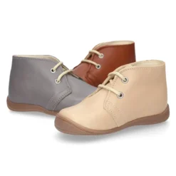 Botita niños cordones con puntera y talonera en piel EXTRA SUAVE.