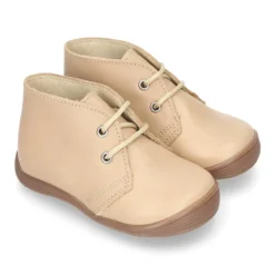 Botita niños cordones con puntera y talonera en piel EXTRA SUAVE.